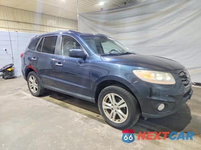 Czwarte zdjęcie samochodu z boku: 2010 HYUNDAI SANTA FE LIMITED VIN:5NMSKDAG1AH339082 - miniatura