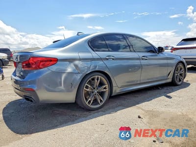 Trzecie zdjęcie samochodu z tyłu: 2018 BMW M550XI VIN:WBAJB9C5XJB035853 - miniatura