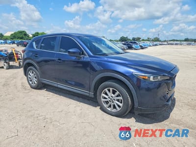 Czwarte zdjęcie samochodu z boku: 2022 MAZDA CX-5 SELECT VIN:JM3KFBBM9N0586120 - miniatura