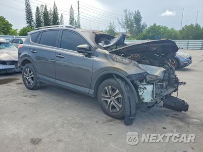 Czwarte zdjęcie samochodu z boku: 2017 TOYOTA RAV4 LE VIN:JTMZFREV8HJ115269 - miniatura