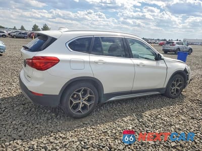 Trzecie zdjęcie samochodu z tyłu: 2018 BMW X1 XDRIVE28I VIN:WBXHT3C3XJ3H31297 - miniatura