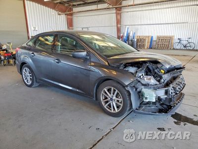 Czwarte zdjęcie samochodu z boku: 2018 FORD FOCUS SE VIN:1FADP3FEXJL205204 - miniatura