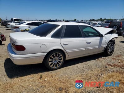 Trzecie zdjęcie samochodu z tyłu: 1995 FORD TAURUS GL VIN:1FALP52U2SA122335 - miniatura
