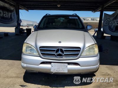 Piąte zdjęcie samochodu w środku: 2000 MERCEDES-BENZ ML 320 VIN:4JGAB54E1YA147124 - miniatura