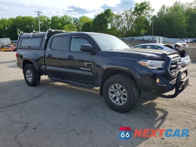 Czwarte zdjęcie samochodu z boku: 2017 TOYOTA TACOMA SR5 V6 VIN:5TFDZ5BN4HX028349 - miniatura