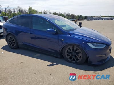 Czwarte zdjęcie samochodu z boku: 2022 TESLA MODEL X VIN:7SAXCAE59NF361559 - miniatura