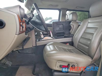 Zdjęcie 7 z 13 samochodu: 2004 HUMMER H2 VIN:5GRGN23U74H100340 - miniatura