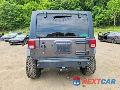 Zdjęcie 6 z 12 samochodu: 2014 JEEP WRANGLER UNLIMITED RUBICON VIN:1C4BJWFG1EL214403 - miniatura