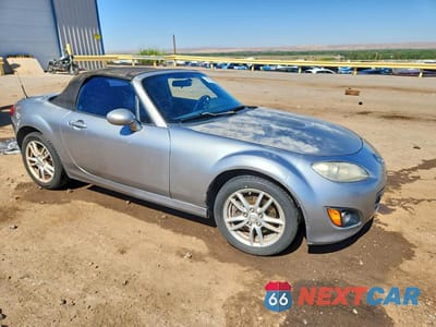 Czwarte zdjęcie samochodu z boku: 2010 MAZDA MX-5 MIATA VIN:JM1NC2EF8A0209610 - miniatura