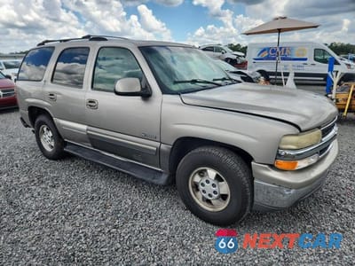 Czwarte zdjęcie samochodu z boku: 2000 CHEVROLET TAHOE C1500 VIN:1GNEC13T6YJ189601 - miniatura