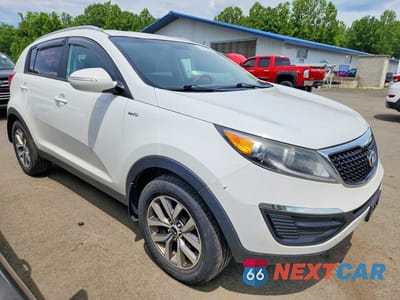 Czwarte zdjęcie samochodu z boku: 2014 KIA SPORTAGE LX VIN:KNDPBCAC7E7570885 - miniatura