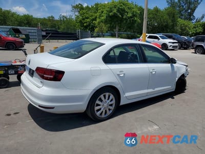 Trzecie zdjęcie samochodu z tyłu: 2017 VOLKSWAGEN JETTA S VIN:3VW2B7AJ9HM322192 - miniatura