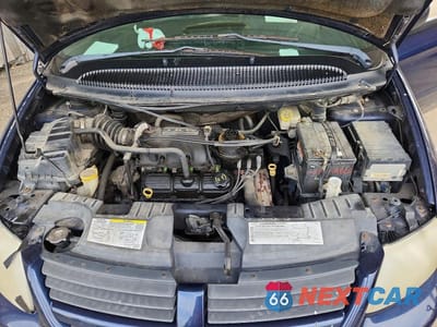 Zdjęcie 12 z 13 samochodu: 2005 DODGE GRAND CARAVAN SE VIN:2D4GP24R85R146418 - miniatura