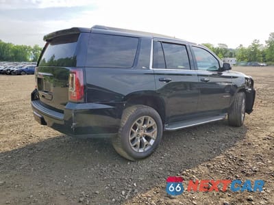 Trzecie zdjęcie samochodu z tyłu: 2016 GMC YUKON SLT VIN:1GKS2BKC4GR124031 - miniatura