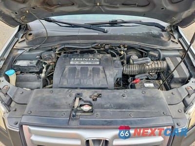 Zdjęcie 12 z 14 samochodu: 2007 HONDA PILOT EXL VIN:2HKYF18567H527321 - miniatura