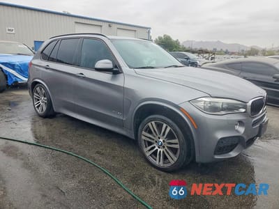 Czwarte zdjęcie samochodu z boku: 2015 BMW X5 XDRIVE50I VIN:5UXKR6C51F0J75373 - miniatura