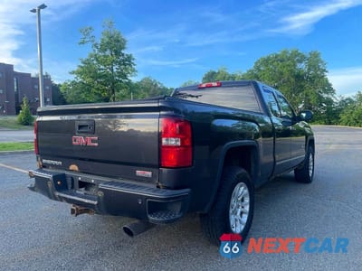 Czwarte zdjęcie samochodu z boku: 2015 GMC SIERRA K1500 SLT VIN:1GTV2VEC2FZ189805 - miniatura