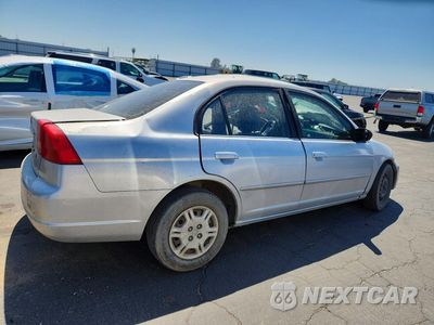 Piąte zdjęcie samochodu w środku: 2002 HONDA CIVIC LX VIN:2HGES16572H581523 - miniatura