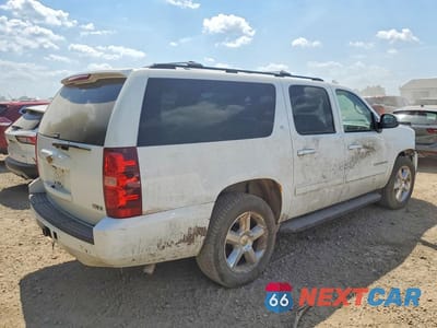 Trzecie zdjęcie samochodu z tyłu: 2010 CHEVROLET SUBURBAN K1500 LT VIN:1GNUKJE35AR188085 - miniatura