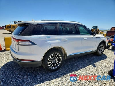 Trzecie zdjęcie samochodu z tyłu: 2020 LINCOLN AVIATOR RESERVE VIN:5LM5J7XC8LGL37483 - miniatura