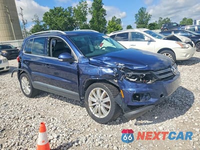 Czwarte zdjęcie samochodu z boku: 2013 VOLKSWAGEN TIGUAN S VIN:WVGBV3AXXDW611370 - miniatura