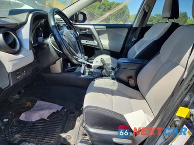 Zdjęcie 7 z 14 samochodu: 2016 TOYOTA RAV4 HV XLE VIN:JTMRJREV3GD007833 - miniatura
