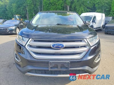 Piąte zdjęcie samochodu w środku: 2018 FORD EDGE TITANIUM VIN:2FMPK4K90JBB42534 - miniatura
