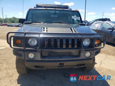 Piąte zdjęcie samochodu w środku: 2004 HUMMER H2 VIN:5GRGN23UX4H103393 - miniatura
