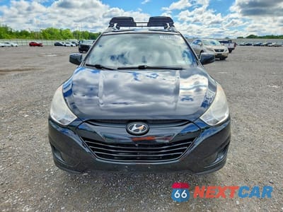 Piąte zdjęcie samochodu w środku: 2011 HYUNDAI TUCSON GLS VIN:KM8JU3AC4BU285781 - miniatura