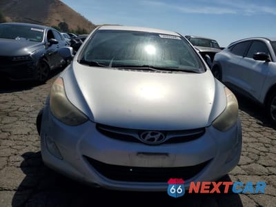 Piąte zdjęcie samochodu w środku: 2012 HYUNDAI ELANTRA GLS VIN:KMHDH4AE2CU341274 - miniatura
