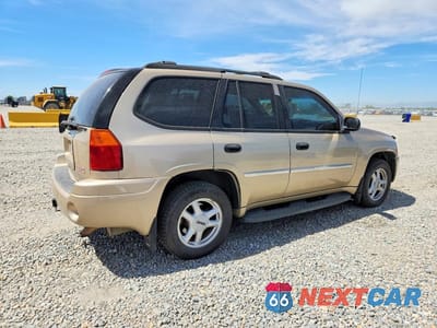 Trzecie zdjęcie samochodu z tyłu: 2007 GMC ENVOY VIN:1GKDT13S372112015 - miniatura