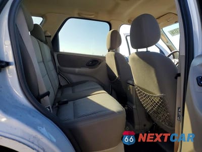 Zdjęcie 11 z 13 samochodu: 2003 FORD ESCAPE XLT VIN:1FMYU93103KE07031 - miniatura