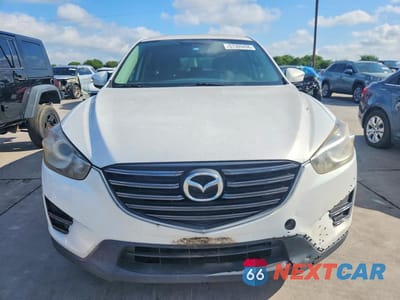 Piąte zdjęcie samochodu w środku: 2016 MAZDA CX-5 SPORT VIN:JM3KE2BY7G0711320 - miniatura