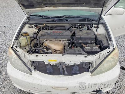 Zdjęcie 11 z 12 samochodu: 2002 TOYOTA CAMRY LE VIN:4T1BE32K32U110056 - miniatura