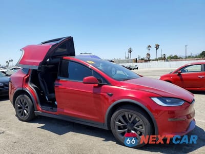 Czwarte zdjęcie samochodu z boku: 2023 TESLA MODEL X VIN:7SAXCBE50PF425335 - miniatura