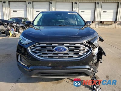 Piąte zdjęcie samochodu w środku: 2021 FORD EDGE TITANIUM VIN:2FMPK3K92MBA51747 - miniatura