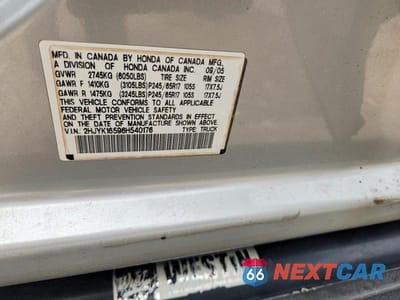 Zdjęcie 12 z 12 samochodu: 2006 HONDA RIDGELINE RTL VIN:2HJYK16596H540176 - miniatura