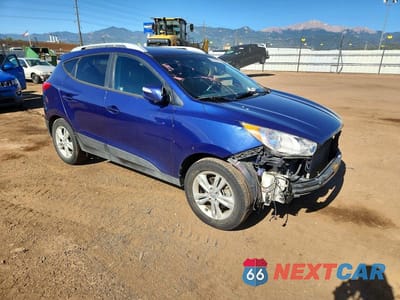 Czwarte zdjęcie samochodu z boku: 2013 HYUNDAI TUCSON GLS VIN:KM8JUCAC6DU629369 - miniatura