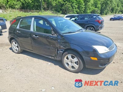 Czwarte zdjęcie samochodu z boku: 2007 FORD FOCUS ZX5 VIN:1FAHP37N57W306691 - miniatura