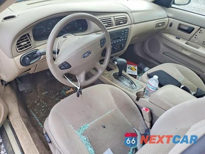 Zdjęcie 8 z 12 samochodu: 2003 FORD TAURUS SE VIN:1FAFP53293G182265 - miniatura