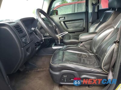 Zdjęcie 7 z 13 samochodu: 2006 HUMMER H3 VIN:5GTDN136868131608 - miniatura