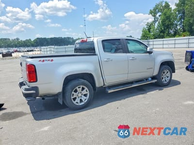 Trzecie zdjęcie samochodu z tyłu: 2018 CHEVROLET COLORADO LT VIN:1GCGTCENXJ1100310 - miniatura