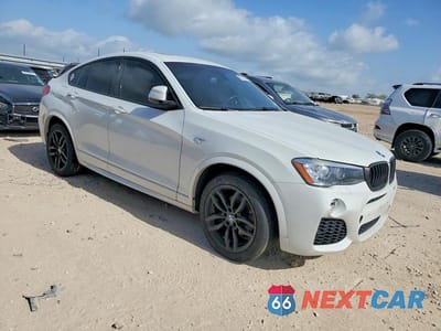 Czwarte zdjęcie samochodu z boku: 2016 BMW X4 XDRIVE35I VIN:5UXXW5C5XG0N91920 - miniatura