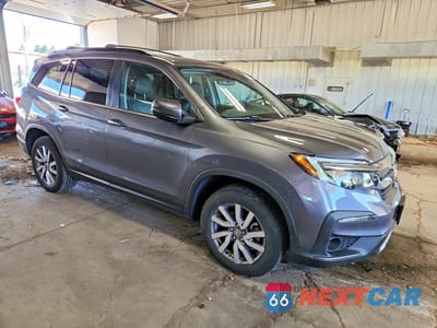 Czwarte zdjęcie samochodu z boku: 2020 HONDA PILOT EXL VIN:5FNYF6H58LB049697 - miniatura