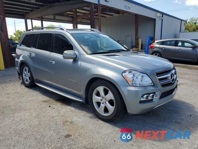 Czwarte zdjęcie samochodu z boku: 2010 MERCEDES-BENZ GL 450 4MATIC VIN:4JGBF7BE4AA546073 - miniatura