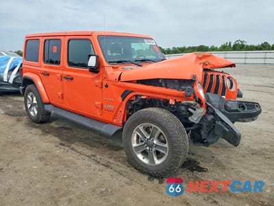 Czwarte zdjęcie samochodu z boku: 2019 JEEP WRANGLER UNLIMITED SAHARA VIN:1C4HJXEN3KW677587 - miniatura