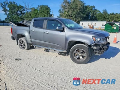 Czwarte zdjęcie samochodu z boku: 2018 CHEVROLET COLORADO Z71 VIN:1GCGSDEN9J1115048 - miniatura