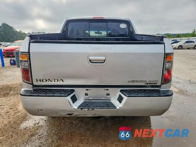 Zdjęcie 6 z 12 samochodu: 2006 HONDA RIDGELINE RTL VIN:2HJYK16596H540176 - miniatura