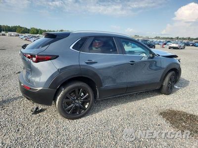 Trzecie zdjęcie samochodu z tyłu: 2023 MAZDA CX-30 PREFERRED VIN:3MVDMBCM5PM538702 - miniatura