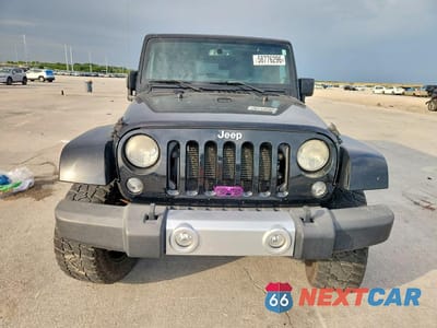 Piąte zdjęcie samochodu w środku: 2014 JEEP WRANGLER UNLIMITED SAHARA VIN:1C4BJWEG9EL305419 - miniatura